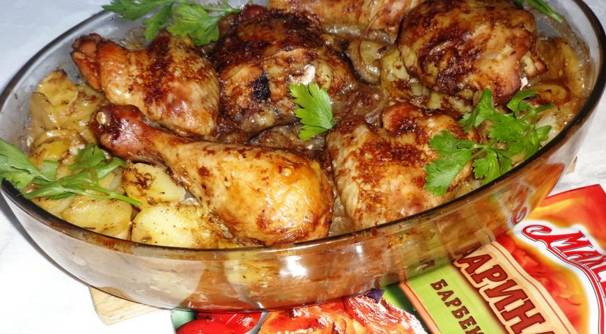 Chicken baked with potatoes and eggplant
