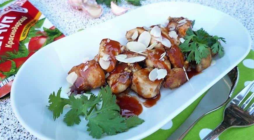 Chicken breast with almonds in sweet and sour glaze