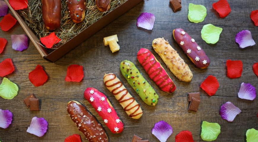 Eclairs with custard and colored glaze