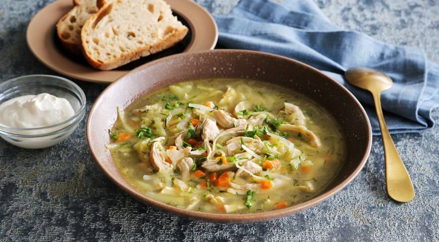 Fresh cabbage soup in chicken broth