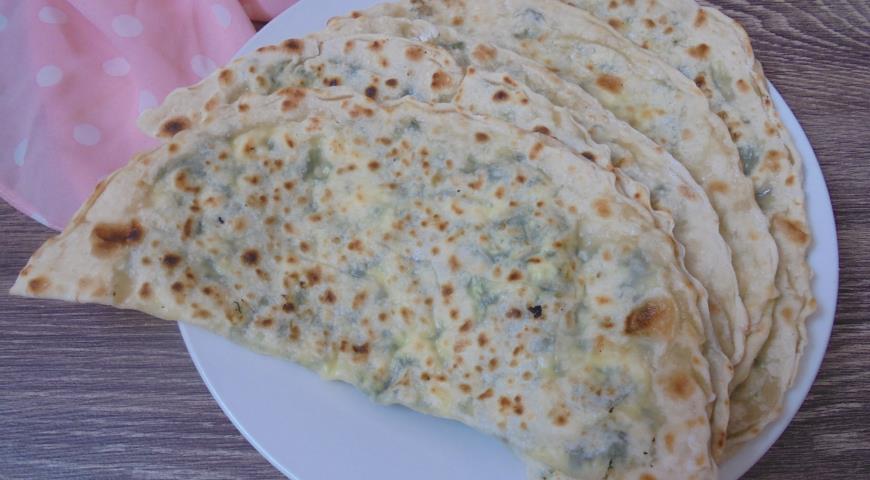 Gozleme flatbreads with curd cheese and herbs