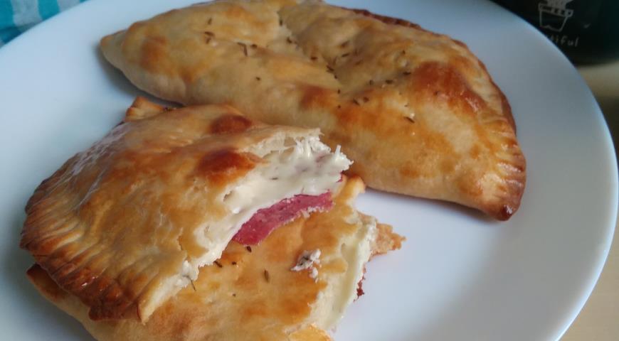 Pie with curd cheese and salami