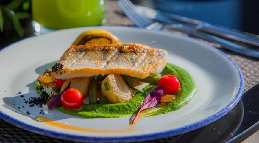 Pike perch fillet with green pea mousse and seasonal vegetables