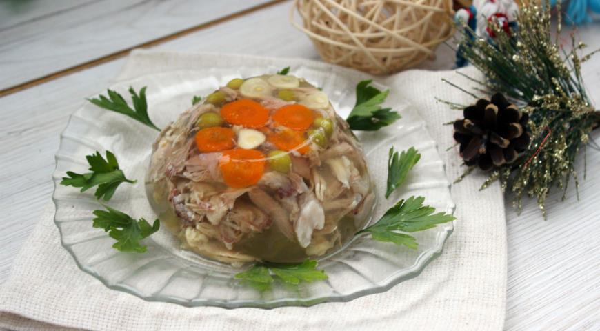Pork shank and chicken jellied meat in a slow cooker