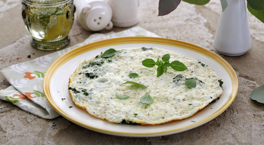 Protein omelet with cheese and spicy herbs