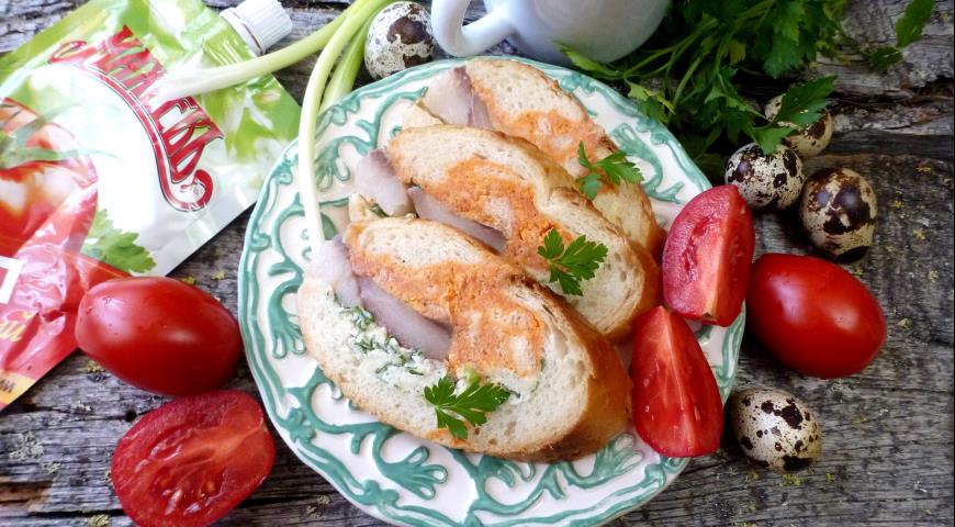 Sandwiches with herring and two types of butter